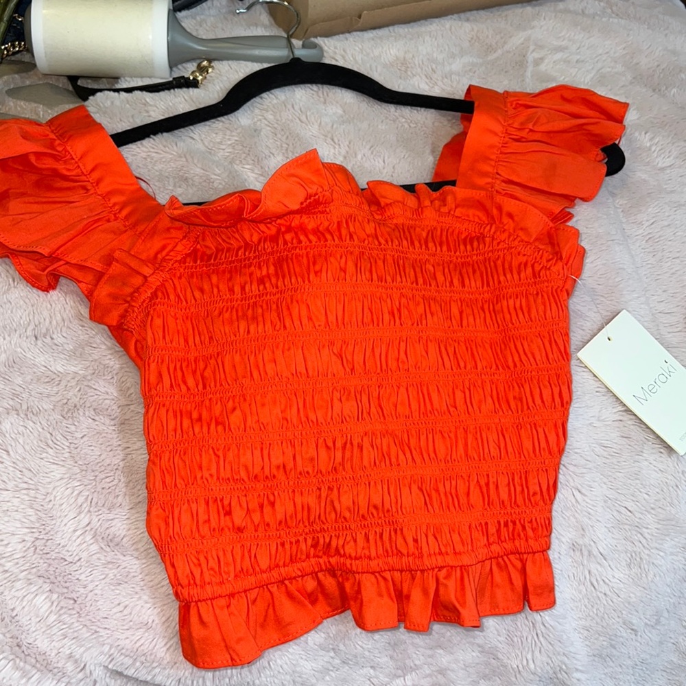 Coral crop top that ties in the back